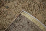 Worn pile texture, fringe, and hand-knotted weave of a vintage distressed Ahar carpet.