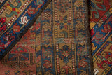 Karaja rug showing plush brick red pile and hand-knotted foundation with visible internal reduction.