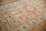 Geometric relief and abrash on a distressed Anatolian rug with mostly even pile wear.