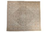 Vintage distressed Bibikabad square carpet with a Herati design and spandrels in beige, sand, and powder blue.