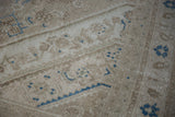 Mostly even wear across to knot heads on the distressed Bibikabad's sand and blue pile.