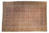 Distressed Kayseri carpet with a blue Herati field and a sand-colored paisley boteh border.