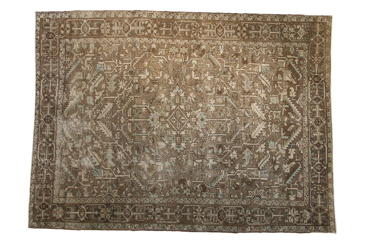 Vintage Distressed Heriz carpet with geometric leaves, palmettes in muted brown, pale blue.