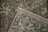 Hand-knotted back and restored side cord of a vintage Persian Heriz rug.