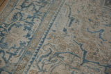 Softly worn hand-knotted pile of a vintage Ahar carpet in muted blue and sand tones.