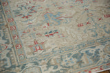 Mostly even wear across the knot heads of a distressed Persian Heriz carpet pile.