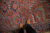 Vibrant Heriz carpet design showing expressive, sprawling leaves in madder red and diverse jewel tones.