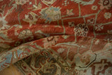 Soft folds of a vintage Heriz runner showing its low, hand-knotted pile and abrashed colors.