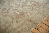 Angled corner view of a distressed Sivas carpet showing its even, low pile.