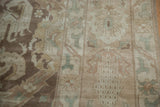 Evenly worn pile of a vintage Sivas carpet showing paneled dragon and deer motifs.