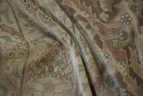 A draped view of the vintage Sivas carpet's even wear and low pile texture.