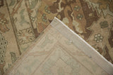 A folded corner of the vintage Sivas carpet shows its hand-knotted foundation and secured side cord.