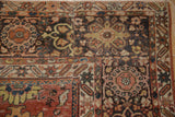 Antique Mahal carpet corner with primitive palmettes, animal motifs in madder red and charcoal.