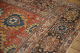 Antique Mahal carpet, madder red field, fire-like palmette, diverse borders, visible wear.