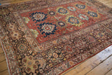 Antique Mahal rug border detail, showing complex primitive floral arabesques and rich patina.