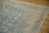 Vintage distressed Afshar rug's Tree of Life motif in sky blue, pale red, and coffee brown.