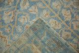 Hand-knotted reverse and machine-bound side of a distressed vintage Afshar rug.
