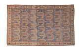 Vintage Distressed Afshar carpet with a geometric boteh pattern in sapphire blue, terracotta, and ivory.