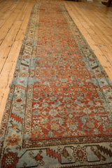 Terracotta and powder blue distressed Bijar runner, serrated leaf floral border detail.
