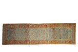 Vintage distressed Afshar runner with terracotta botehs on a heavily abrashed blue and charcoal ground.