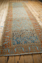 Long perspective view of the distressed Afshar runner and its heavy color abrasion.