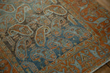 Diagonal botehs and heavy abrashed texture on a distressed vintage Persian Afshar rug.