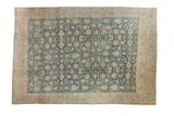 Vintage distressed Bijar carpet with allover palmettes and florals in dusty navy blue and sand.