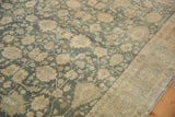 Textured low pile and soft, time-worn floral patterns on a vintage distressed Bijar carpet.