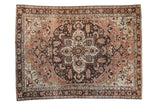 Vintage distressed Hamadan carpet with a sprawling charcoal medallion, a dusty copper rose field, and intricate palmettes.
