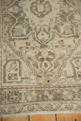 Vintage Karaja runner pile, showing distressed texture with beige and pale silver geometric patterns.
