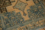 The Samovar main border in dusty sapphire blue showing heavy abrash and wear down to the knot heads.