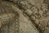 Close-up view of the time-softened pile and hand-knotted texture of a vintage Persian Mahal rug.