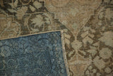 The blue hand-knotted foundation and secured side selvedge of a vintage distressed Persian rug.