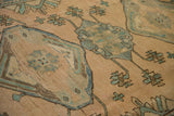 Low-pile texture of a vintage Malayer showing knot heads and serrated floral designs.