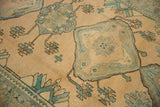 Low pile texture showing knot heads on an asymmetric medallion of a vintage Malayer carpet.