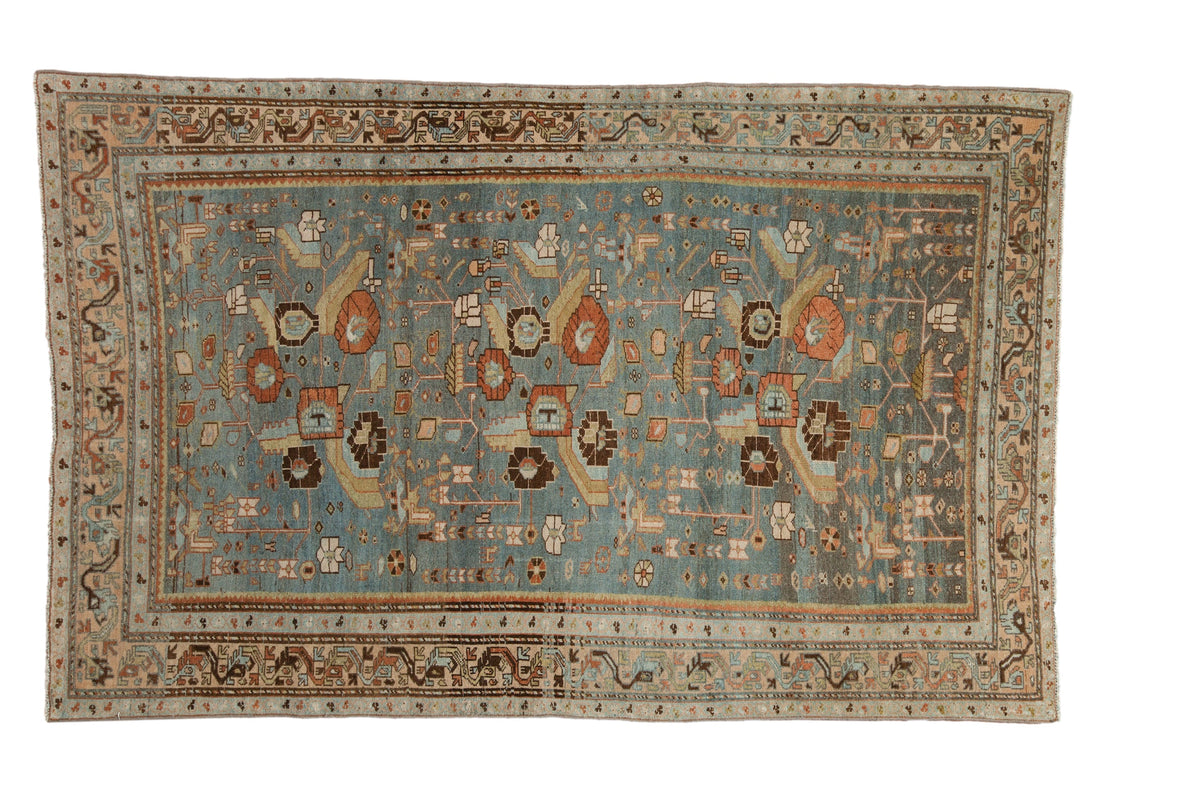 Vintage distressed Malayer rug with floral bouquets on a slate blue field and a serpent design border.