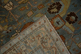 Corner of a vintage Malayer rug showing the hand-knotted foundation and slate blue pile.