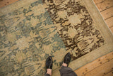 Distressed vintage Bijar rug showing a hard dye lot change from chocolate brown to dusty blue.