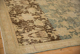 Angled view showing the dynamic dye lot change on a distressed Persian Bijar rug.