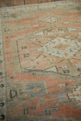 Close-up showing the even, low-pile wear and knot heads of the vintage Veece rug.