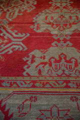 Detailed weave of an antique Turkish Oushak showing the low pile and knot heads.