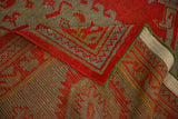 Detail of the antique Oushak's hand-knotted reverse and intact green side cord selvage.