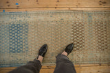 A personal view looking down at the heavy abrash and dye lot striations of a distressed runner.