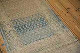 Heavy color abrashes and dye lot variations in the dusty sky blue boteh design.