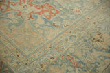 Mostly even wear across the knot heads of a vintage Tabriz carpet's floral border.