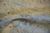 Close-up showing the low pile and soft texture of a hand-knotted Tabriz carpet.