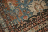 Interconnected boteh border and worn pile showing heavy abrashes on an antique Mehreban rug.