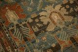 Fine, low pile of an antique Mehreban rug showing scattered animal figures in dusty teal and chestnut.