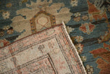 Woven foundation and machine-bound side of a distressed antique Persian Mehreban runner.