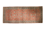 Vintage distressed Persian Bibikabad runner with an allover floral pattern in ruby red and dusty teal.